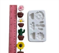 Molde de silicona no.033 modelo macetas con flores y cactus x3 formas de 2 a 3cms. aprox.